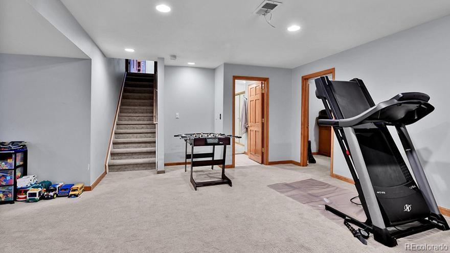 4852 South Carson Street Aurora, CO 80015 - Photo 36 of 48 a view of a room with gym equipment