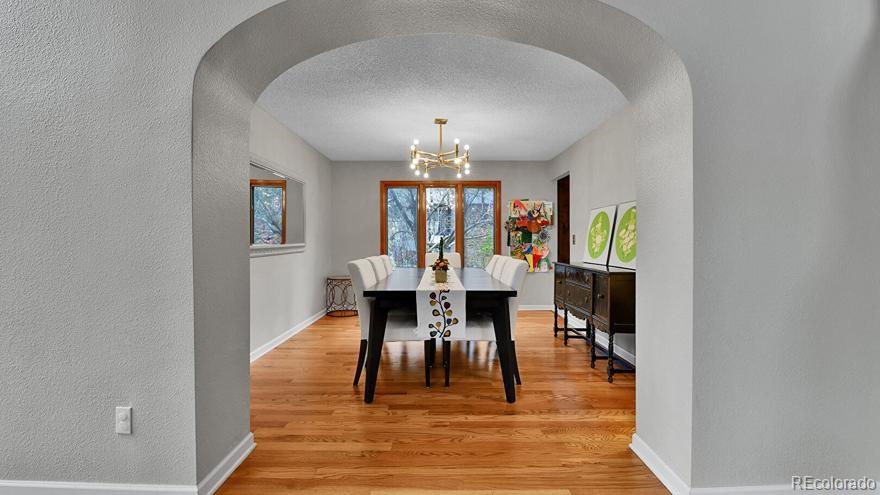 4852 South Carson Street Aurora, CO 80015 - Photo 9 of 48 a view of a dining room with furniture and window