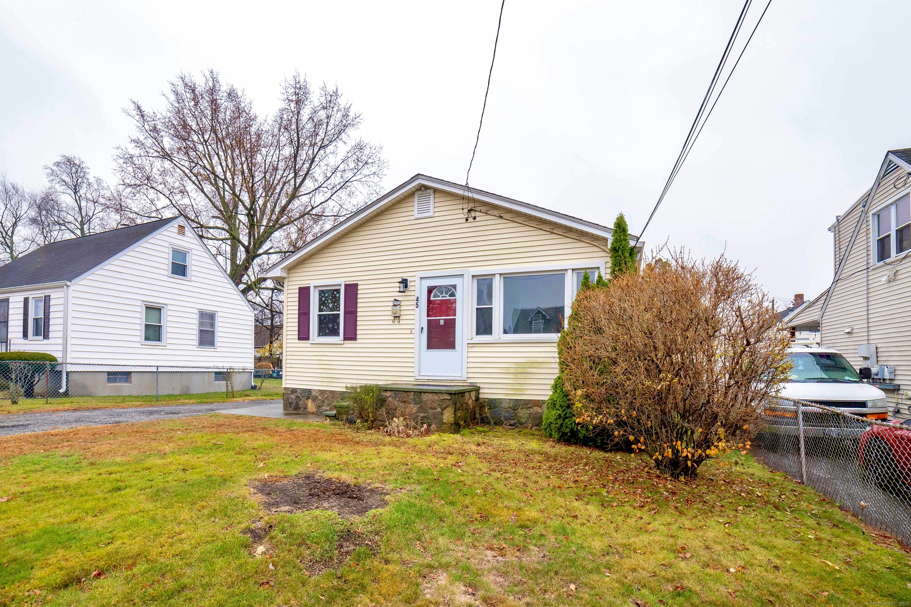 45 Voight Avenue Bridgeport, CT 06606 - Photo 2 of 27 a view of a house with a yard patio and fire pit