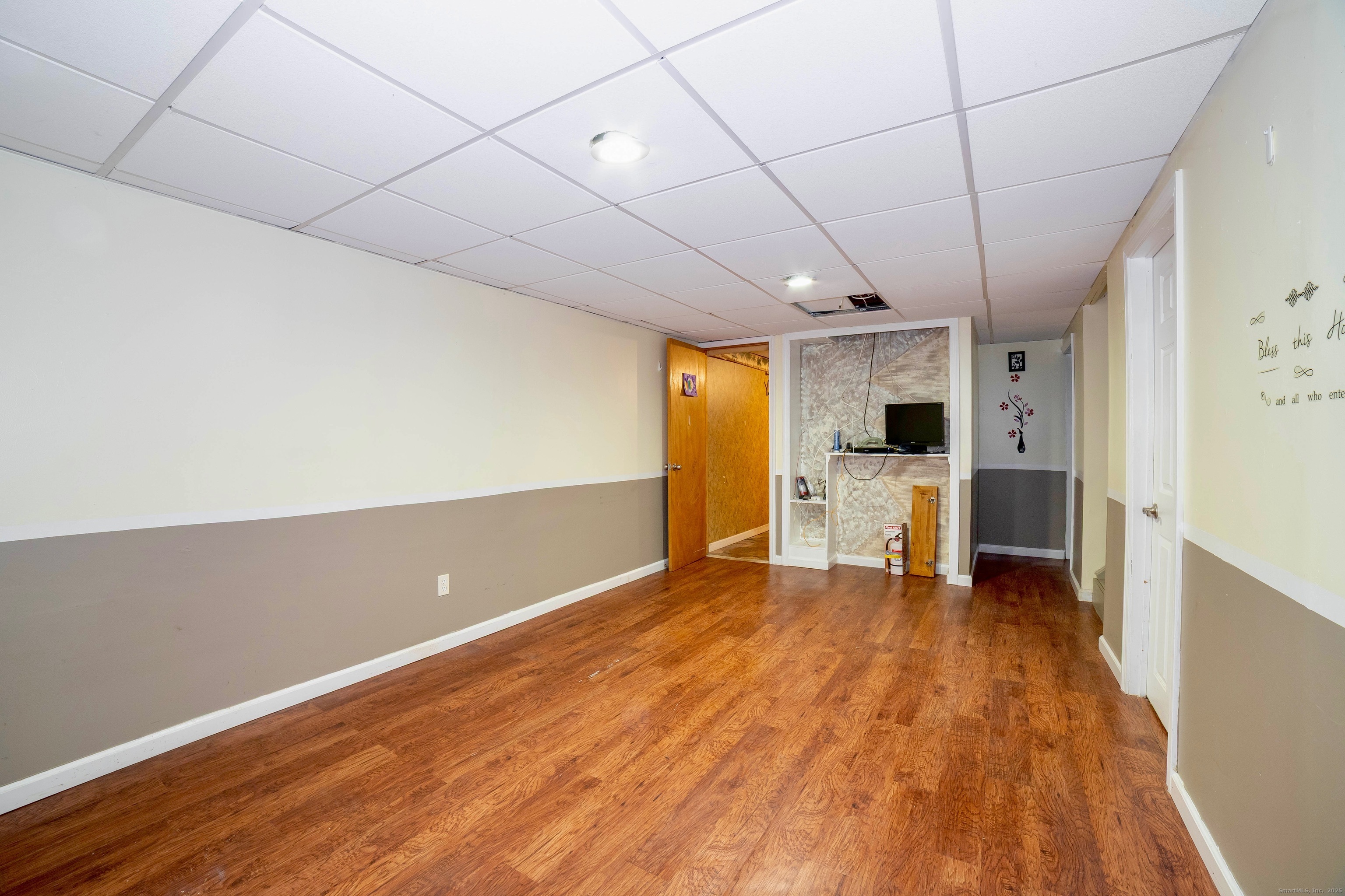 45 Voight Avenue Bridgeport, CT 06606 - Photo 26 of 27 a view of a livingroom with wooden floor