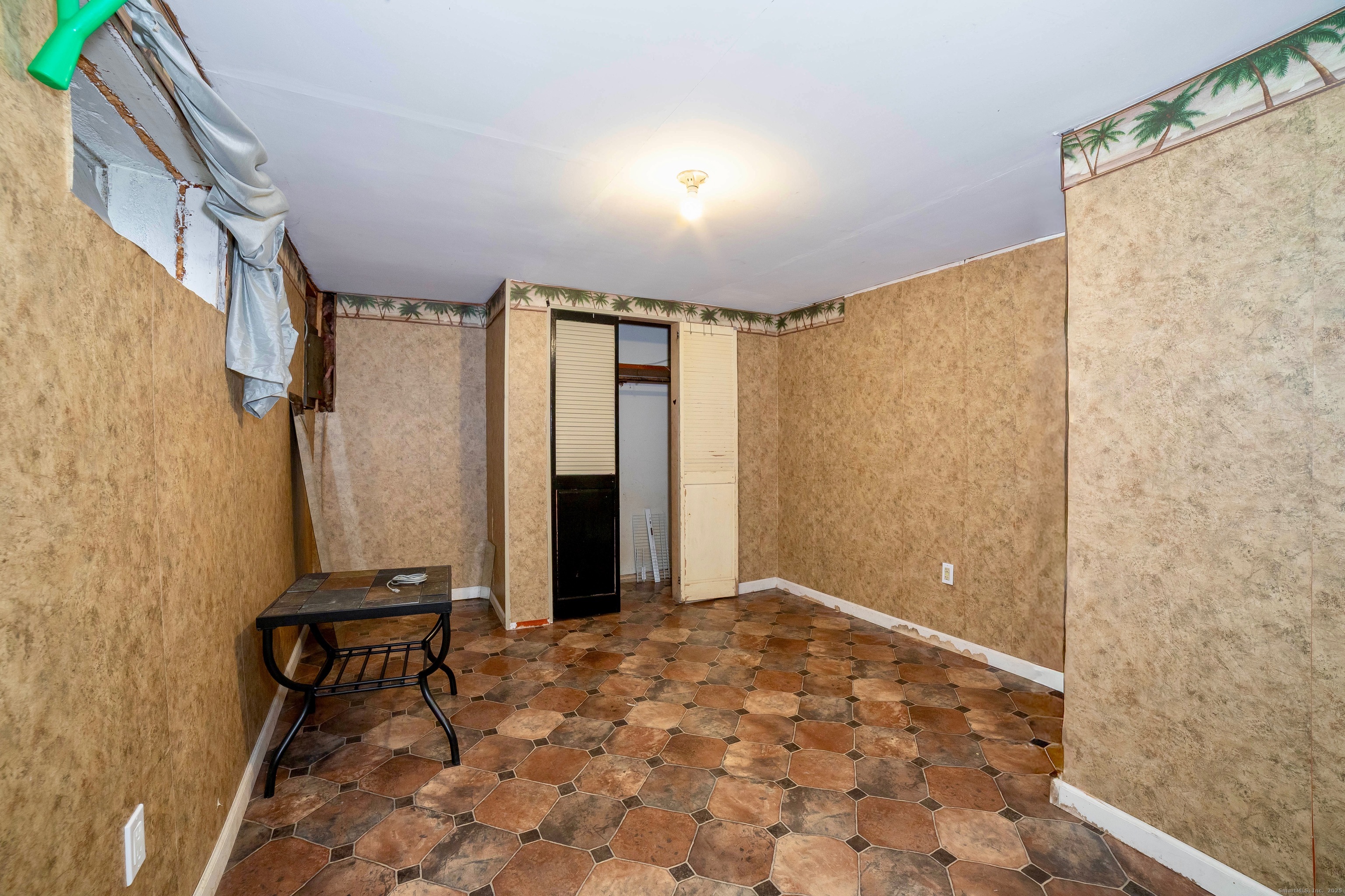45 Voight Avenue Bridgeport, CT 06606 - Photo 27 of 27 a view of a bathroom with a shower and a sink