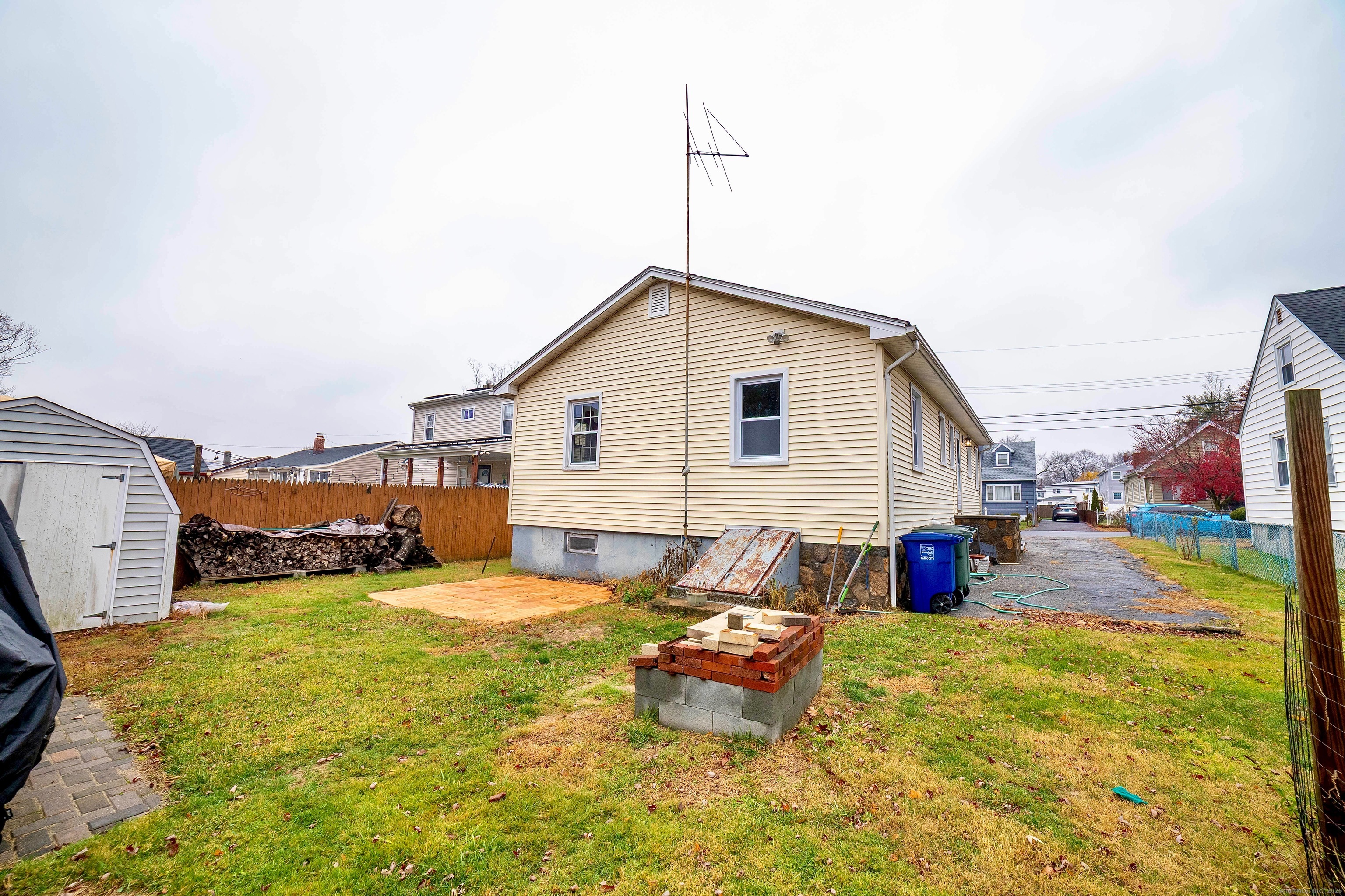 45 Voight Avenue Bridgeport, CT 06606 - Photo 6 of 27 a view of a house with a yard and sitting area
