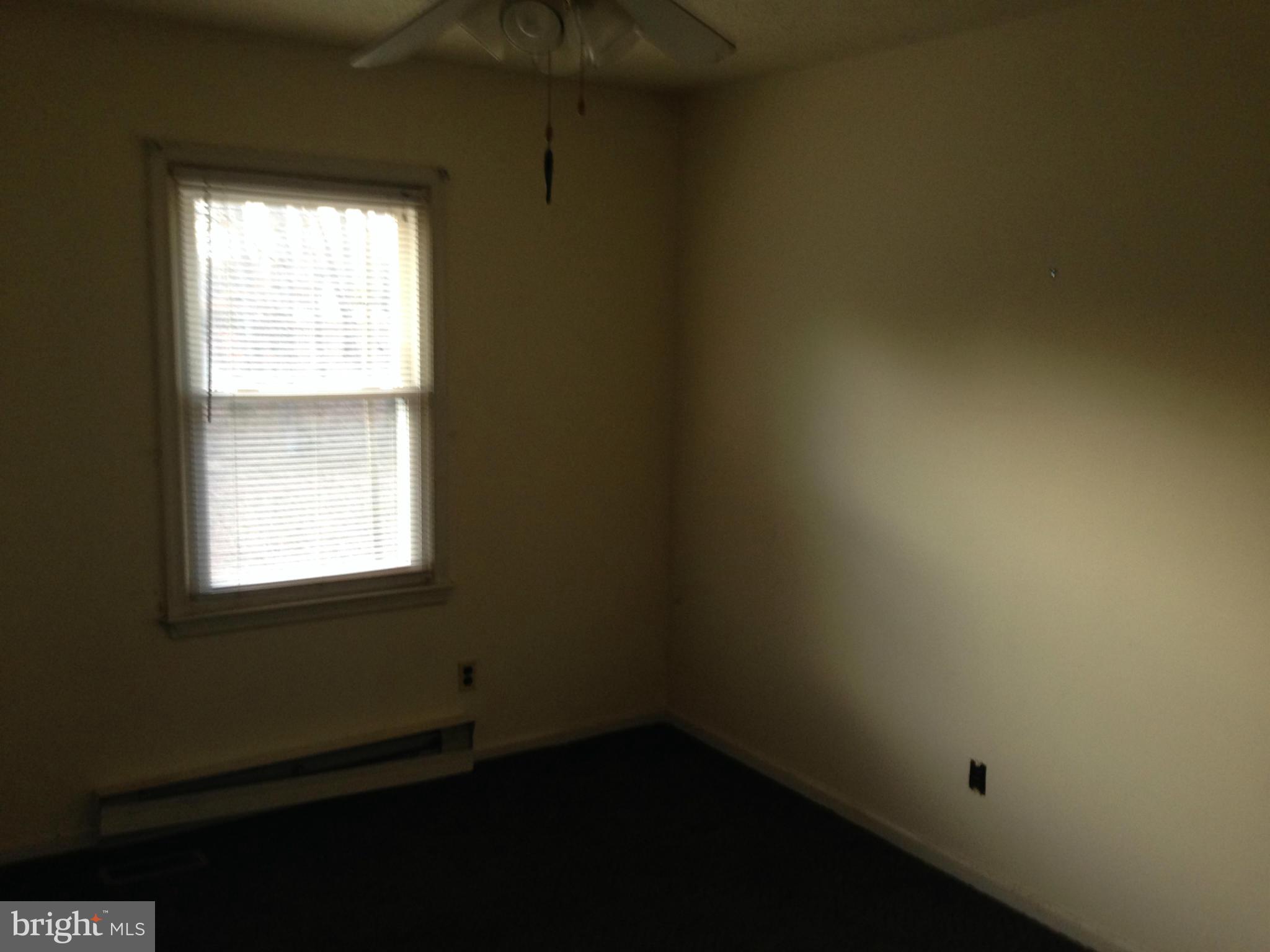 5176 Stewart Road Sumerduck, VA 22742 - Photo 6 of 10 an empty room with a window