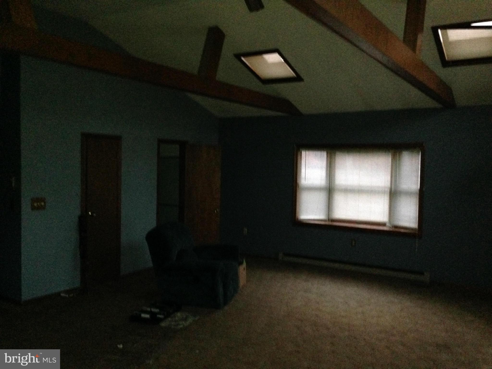 5176 Stewart Road Sumerduck, VA 22742 - Photo 9 of 10 a view of an empty room with a window