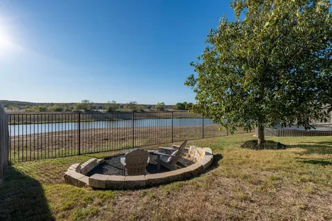 a view of a swimming pool and a lake