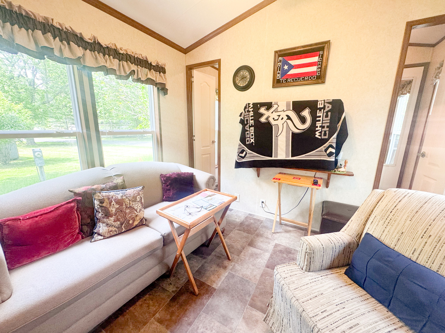 7-98 Woodhaven Sublette, IL 61367 - Photo 18 of 23 a living room with furniture and a large window