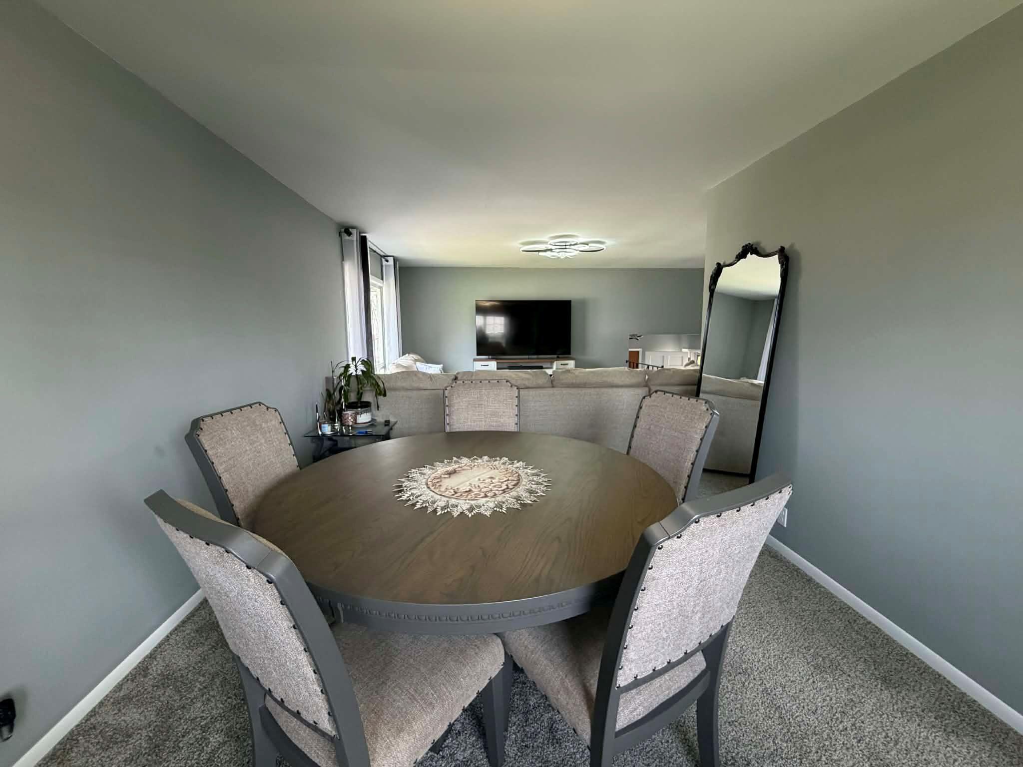 716 East Stewart Drive Rensselaer, IN 47978 - Photo 5 of 22 a view of a dining room with furniture
