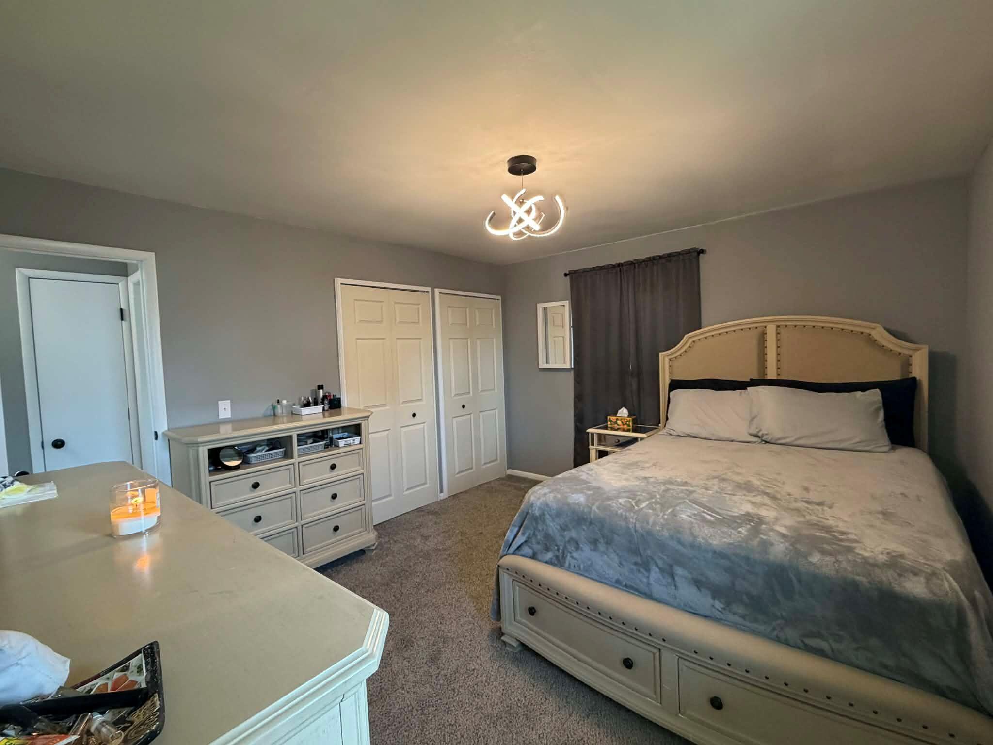 716 East Stewart Drive Rensselaer, IN 47978 - Photo 10 of 22 a bedroom with a bed and a dresser