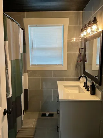a bathroom with a toilet and a sink