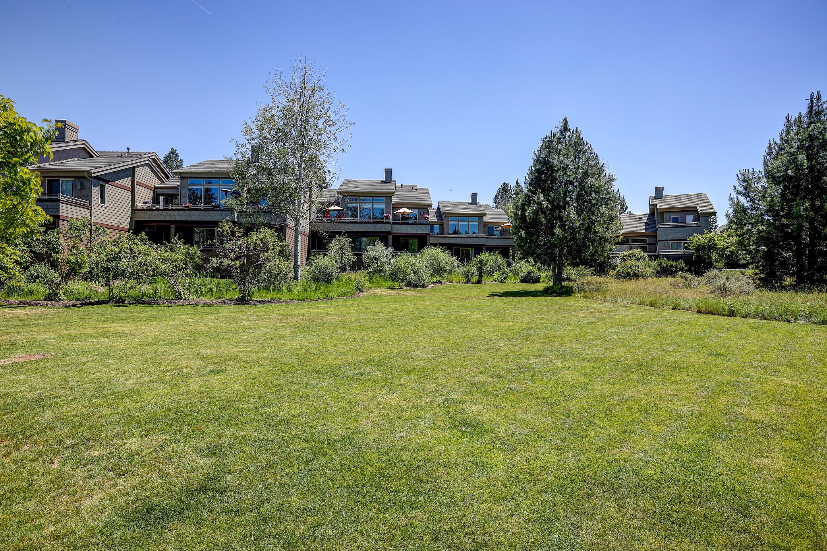 19574 Painted Ridge Loop, Unit 16 Bend, OR 97702 - Photo 33 of 43 Rear view of the property