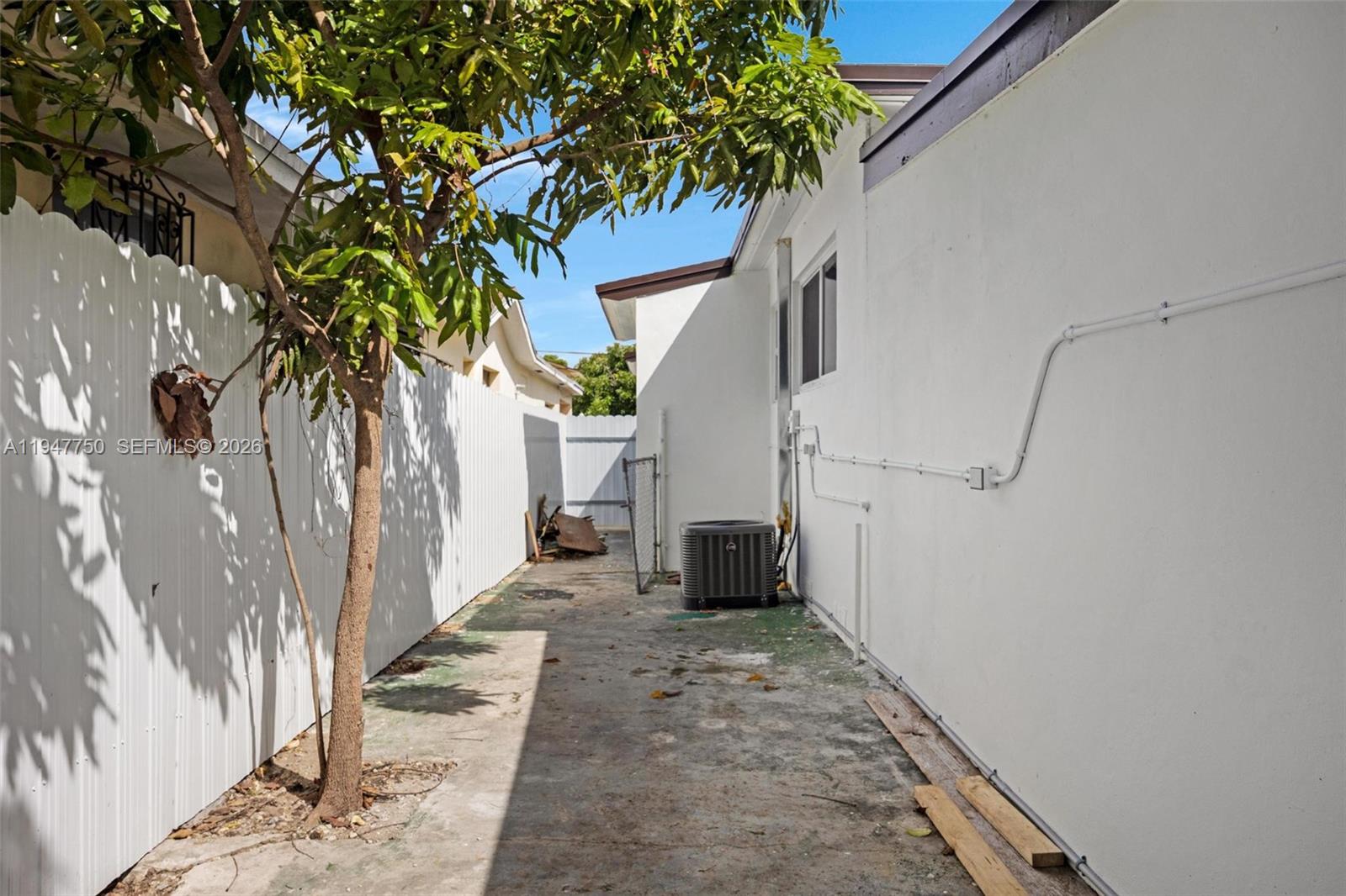 2530 Southwest 16th Terrace, Unit 1 Miami, FL 33145 - Photo 12 of 48 a view of a backyard with potted plants