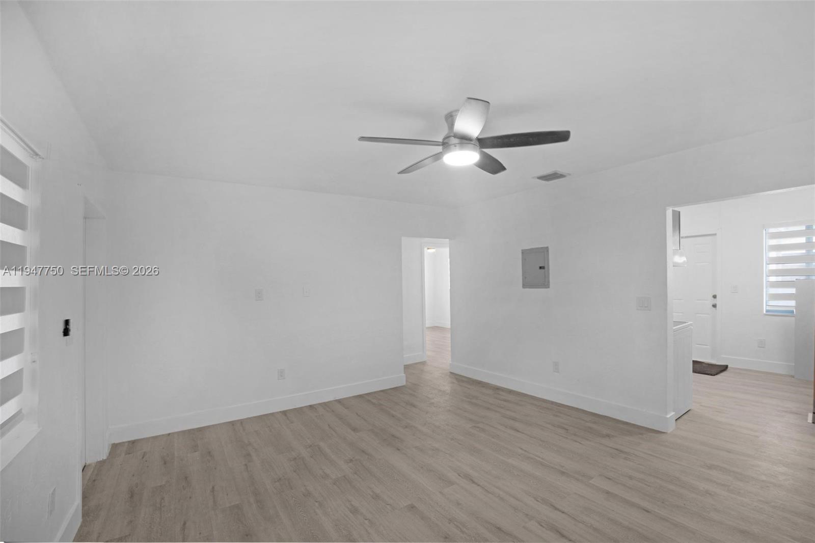 2530 Southwest 16th Terrace, Unit 1 Miami, FL 33145 - Photo 26 of 48 wooden floor in an empty room with a window