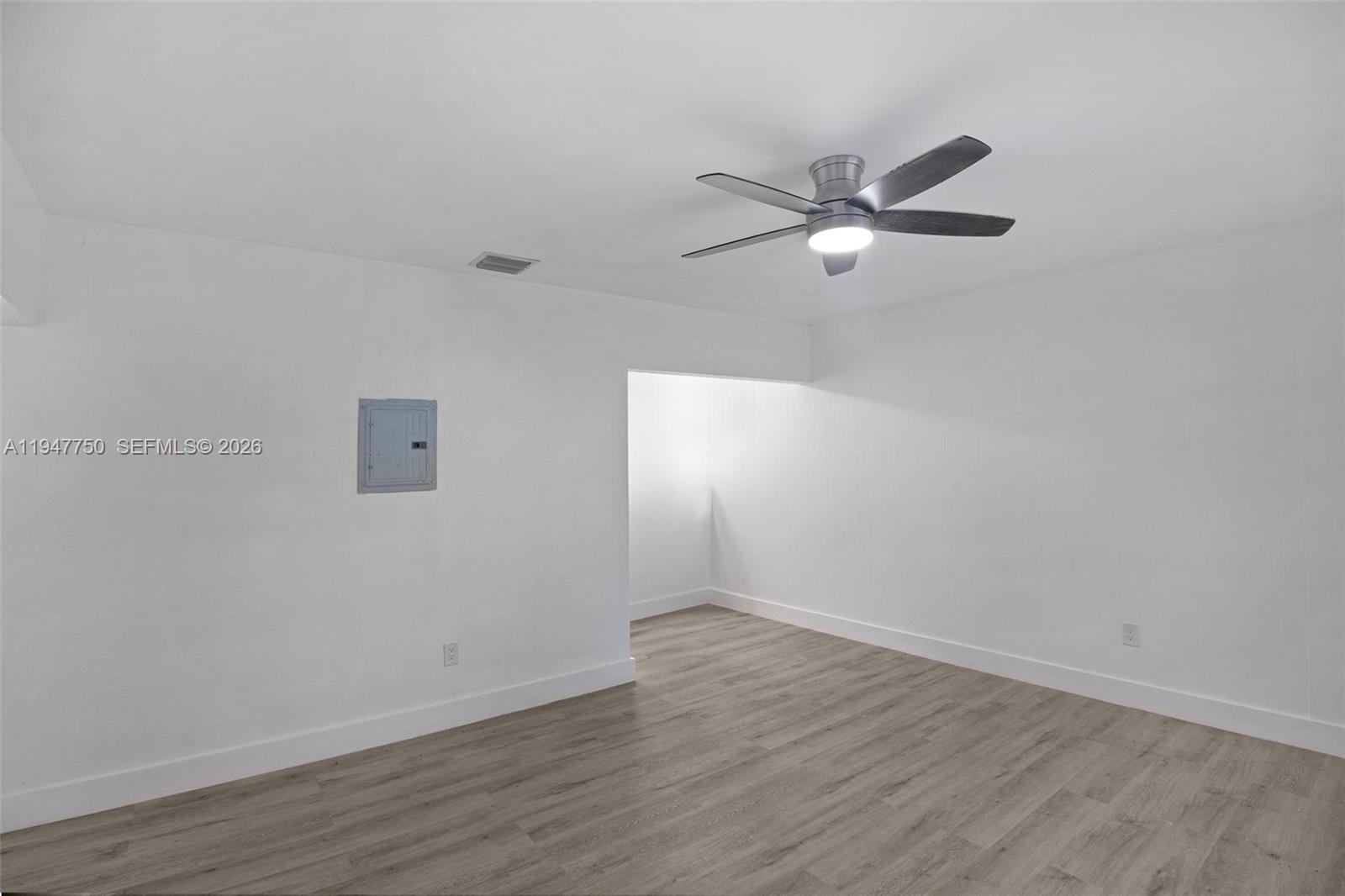 2530 Southwest 16th Terrace, Unit 1 Miami, FL 33145 - Photo 27 of 48 a view of empty room with wooden floor