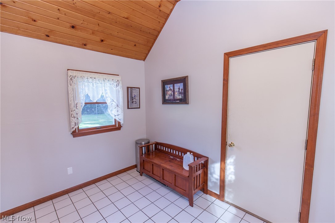 33796 Bainbridge Road North Ridgeville, OH 44039 - Photo 23 of 35 Mudroom with vaulted ceiling connects garage to house and also has a family entry from driveway