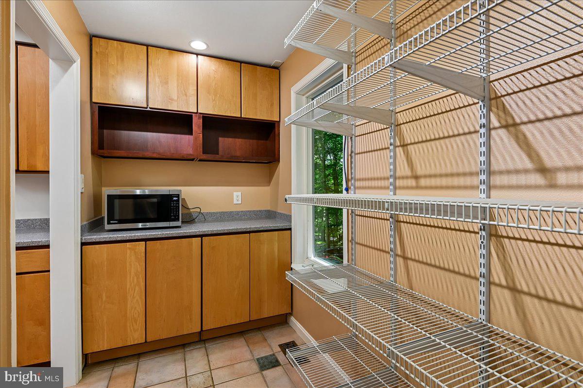 3633 Patuxent River Road Davidsonville, MD 21035 - Photo 32 of 85 Kitchen Walk-in Pantry with Cabinetry and Shelving