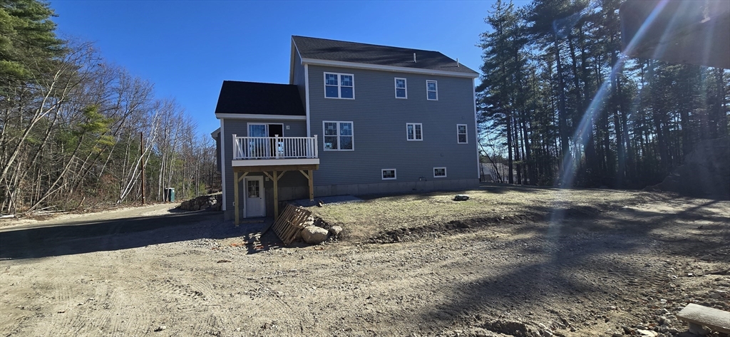 437 West Townsend Road Lunenburg, MA 01462 - Photo 5 of 32 a front view of a house with a yard