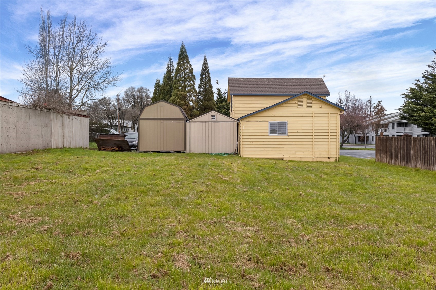 685 Spring Street Friday Harbor, WA 98250 - Photo 17 of 23 a view of a house with a yard and garage