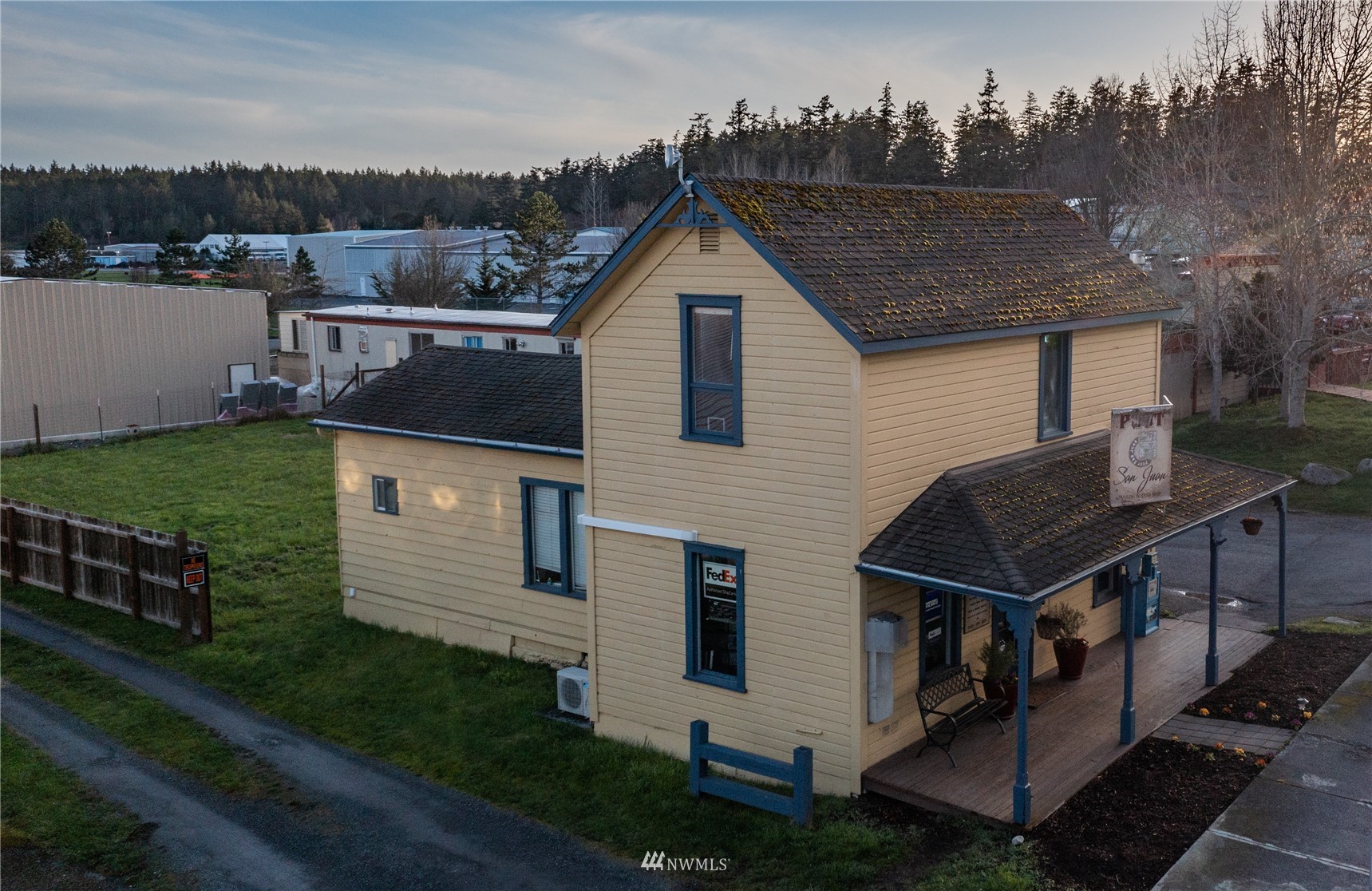 685 Spring Street Friday Harbor, WA 98250 - Photo 18 of 23 a aerial view of a house next to a yard
