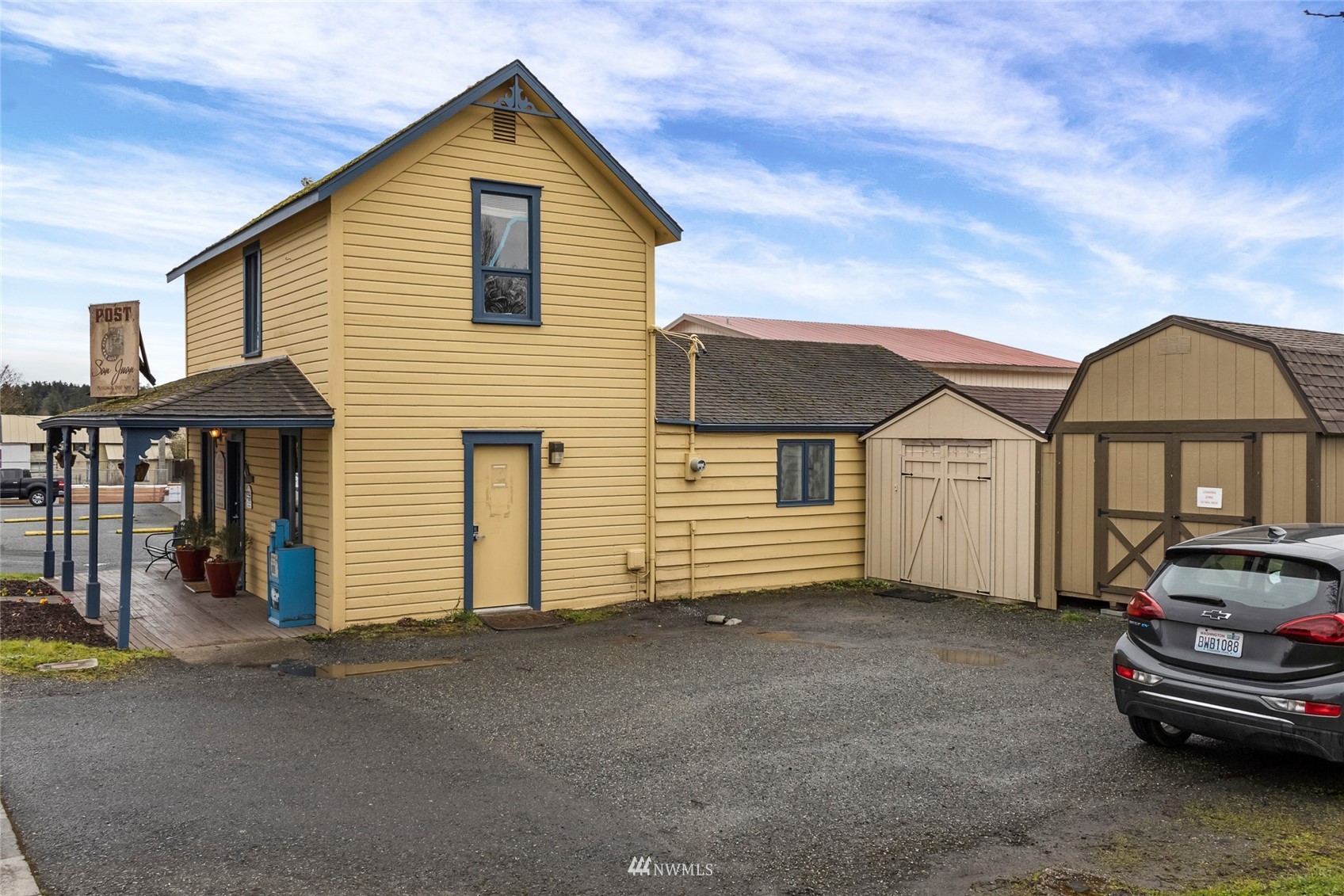 685 Spring Street Friday Harbor, WA 98250 - Photo 3 of 23 a car parked in front of a house