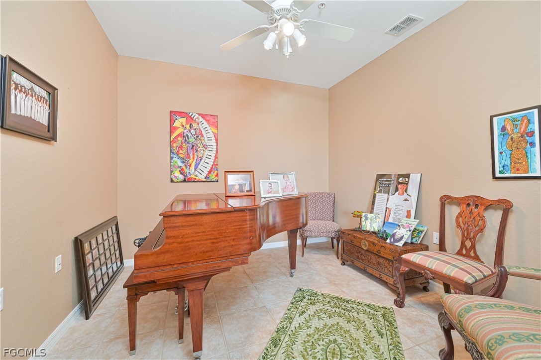 8251 Pathfinder Loop, Unit 641 Fort Myers, FL 33919 - Photo 14 of 37 a living room with furniture and a rug