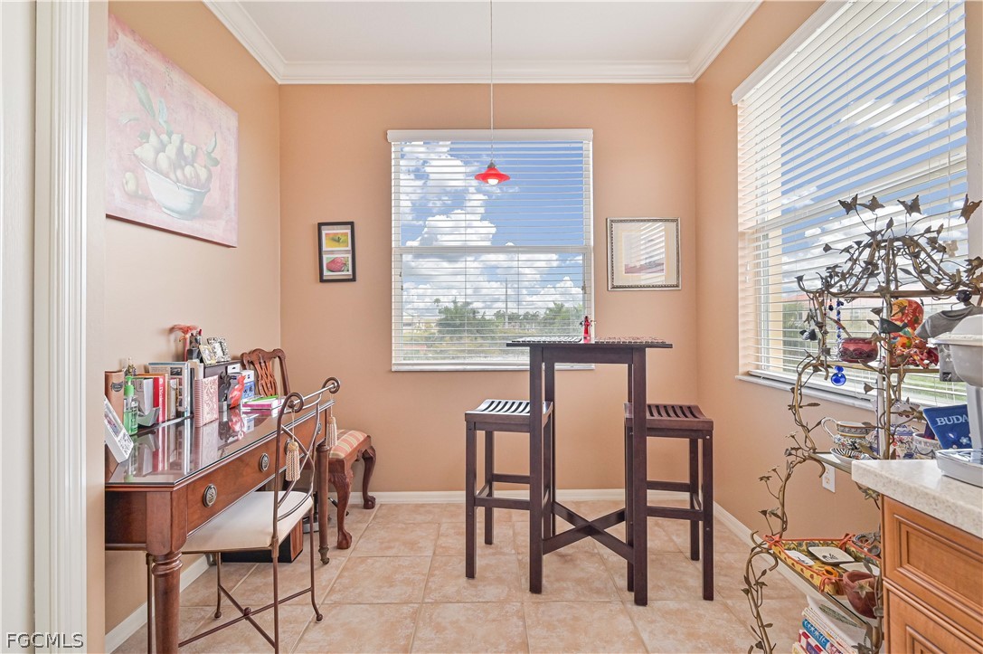 8251 Pathfinder Loop, Unit 641 Fort Myers, FL 33919 - Photo 20 of 37 a dining room with furniture and window