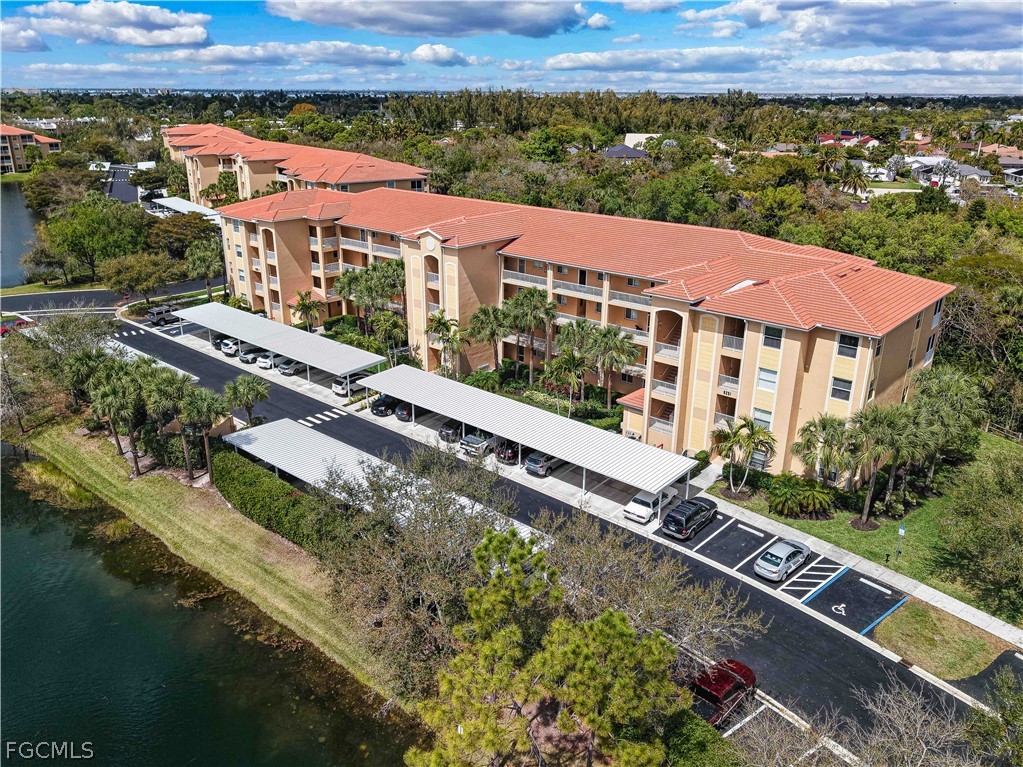 8251 Pathfinder Loop, Unit 641 Fort Myers, FL 33919 - Photo 2 of 37 an aerial view of a house