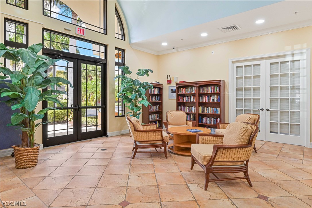 8251 Pathfinder Loop, Unit 641 Fort Myers, FL 33919 - Photo 29 of 37 a outdoor living space with furniture and a potted plant