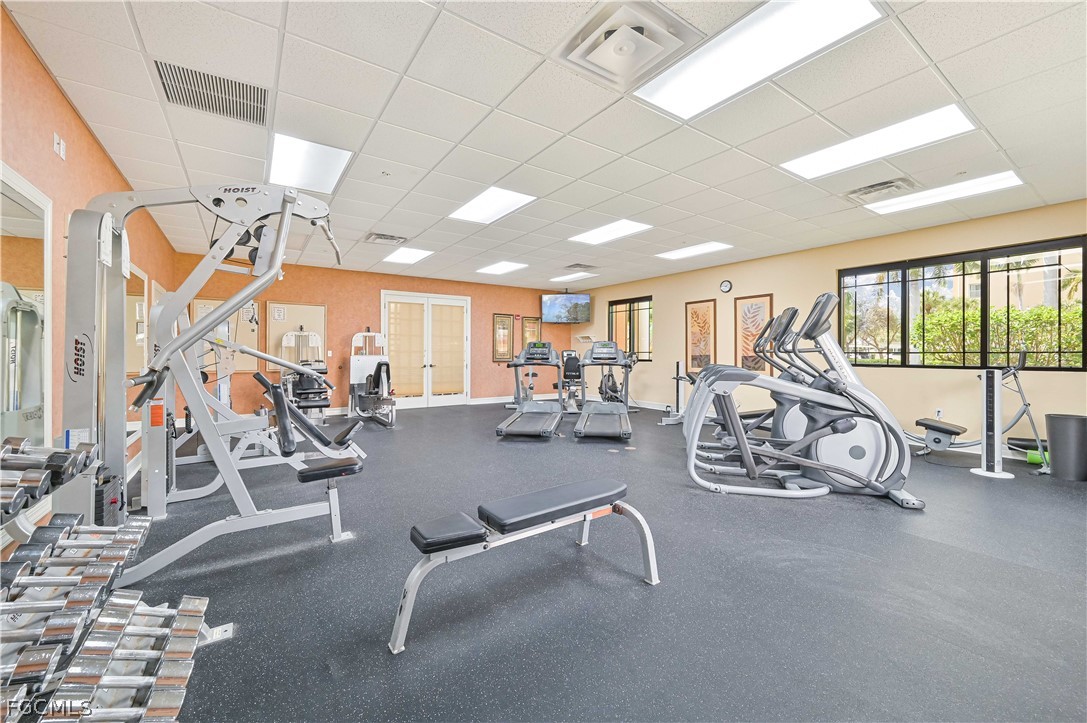 8251 Pathfinder Loop, Unit 641 Fort Myers, FL 33919 - Photo 32 of 37 a view of a room with gym equipment