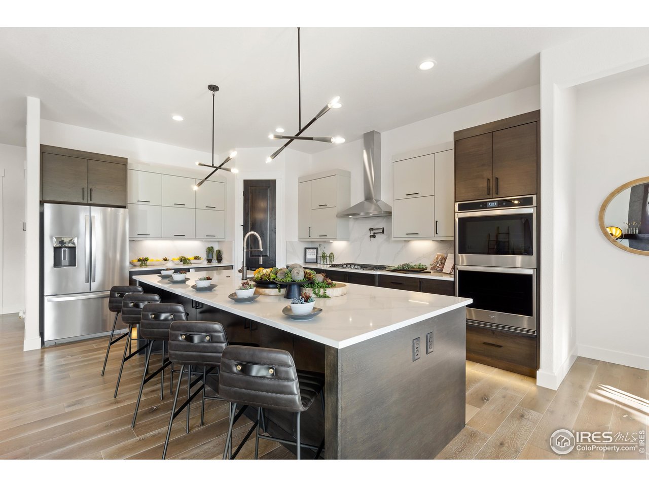 2045 Morningstar Way Fort Collins, CO 80524 - Photo 12 of 35 Upgraded Gourmet Kitchen with Custom Cabinets by Tharp