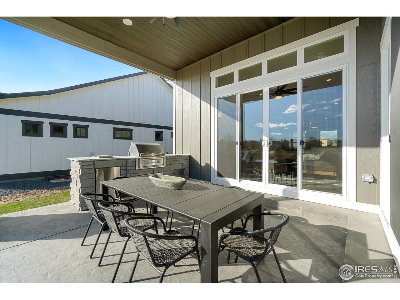 2045 Morningstar Way Fort Collins, CO 80524 - Photo 33 of 35 Covered Back Patio with Outdoor Kitchen!