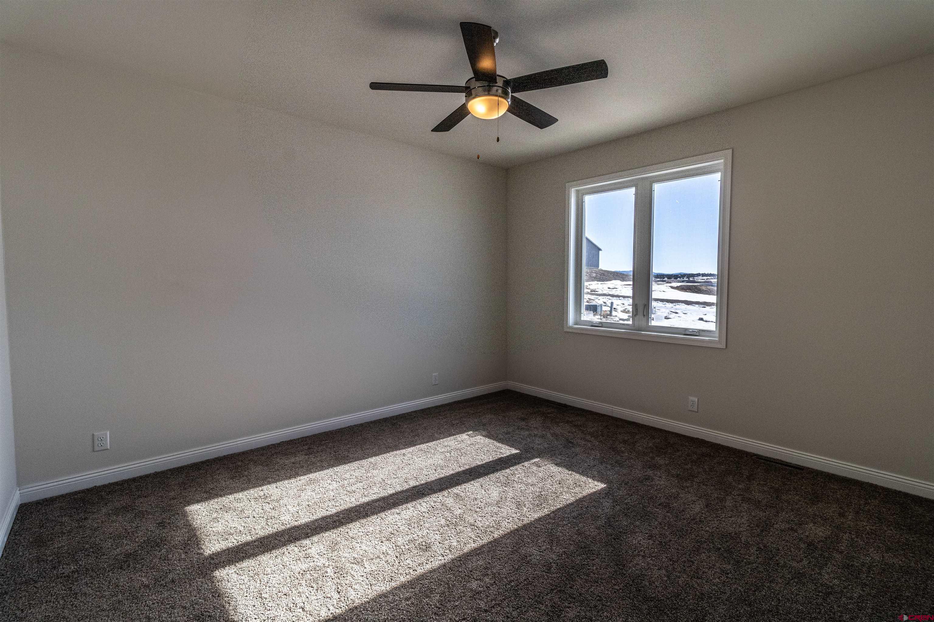 200 Chesterfield Place Ignacio, CO 81137 - Photo 15 of 35 a view of an empty room with a window