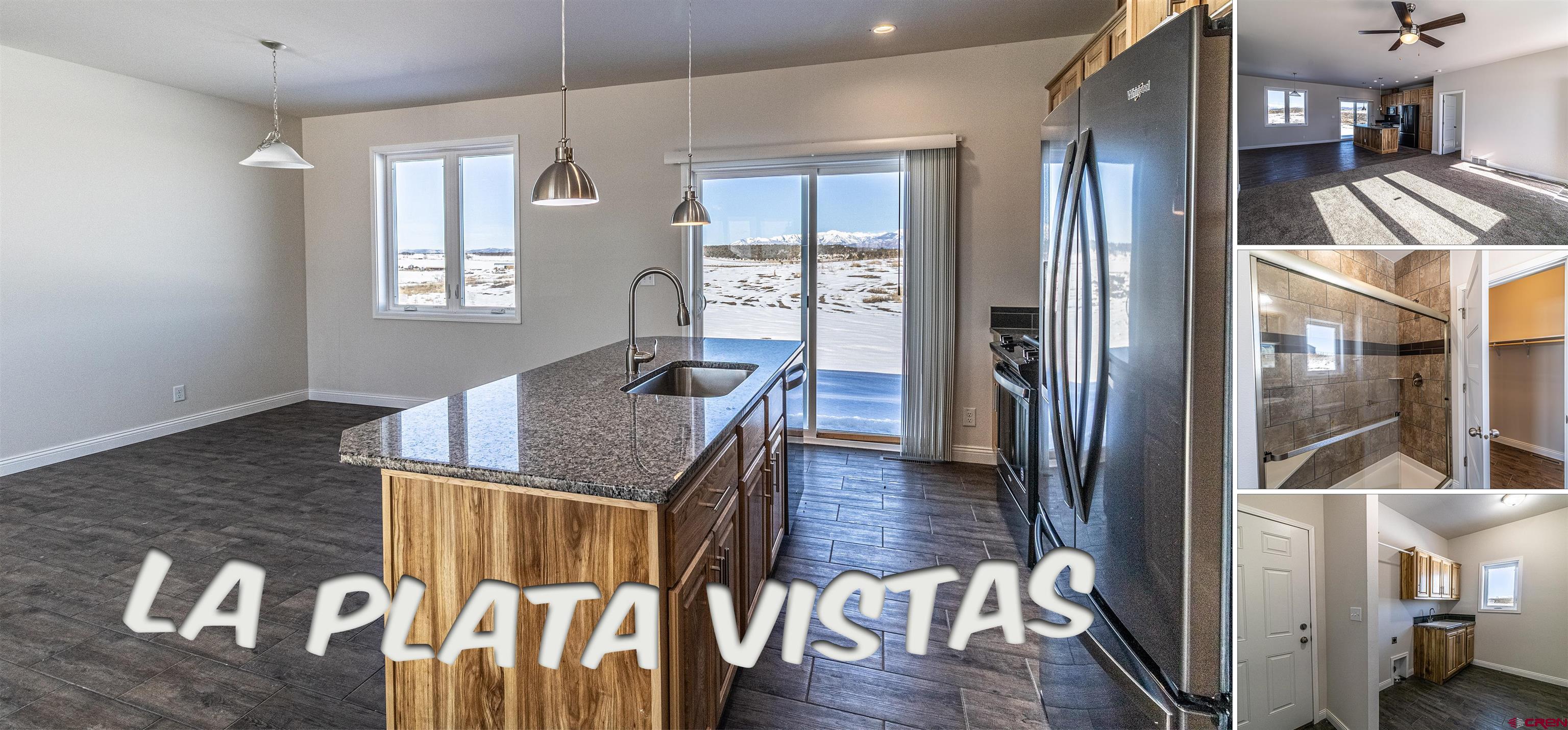 200 Chesterfield Place Ignacio, CO 81137 - Photo 2 of 35 a view of a hallway with wooden floor and dining room