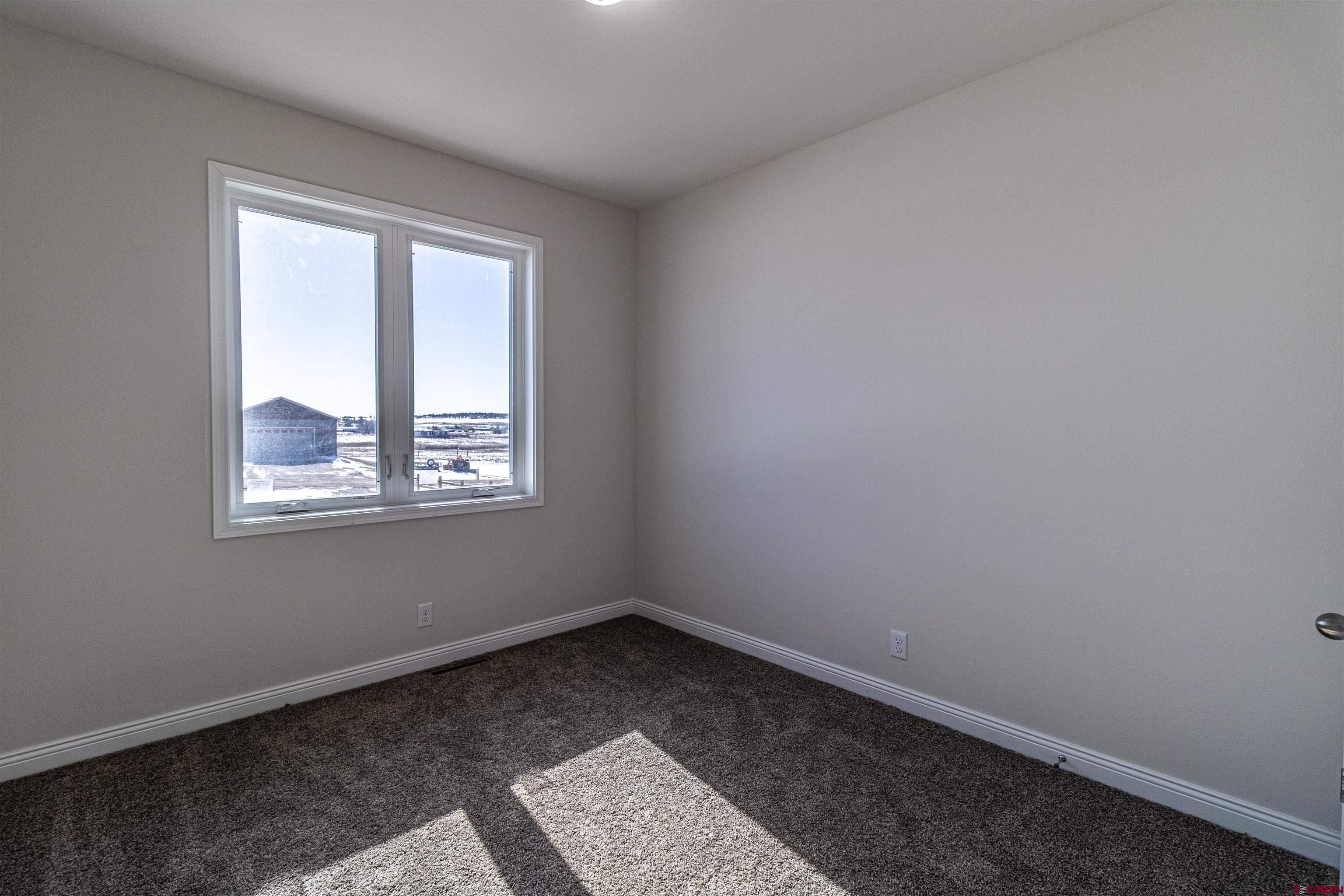 200 Chesterfield Place Ignacio, CO 81137 - Photo 27 of 35 an empty room with a window