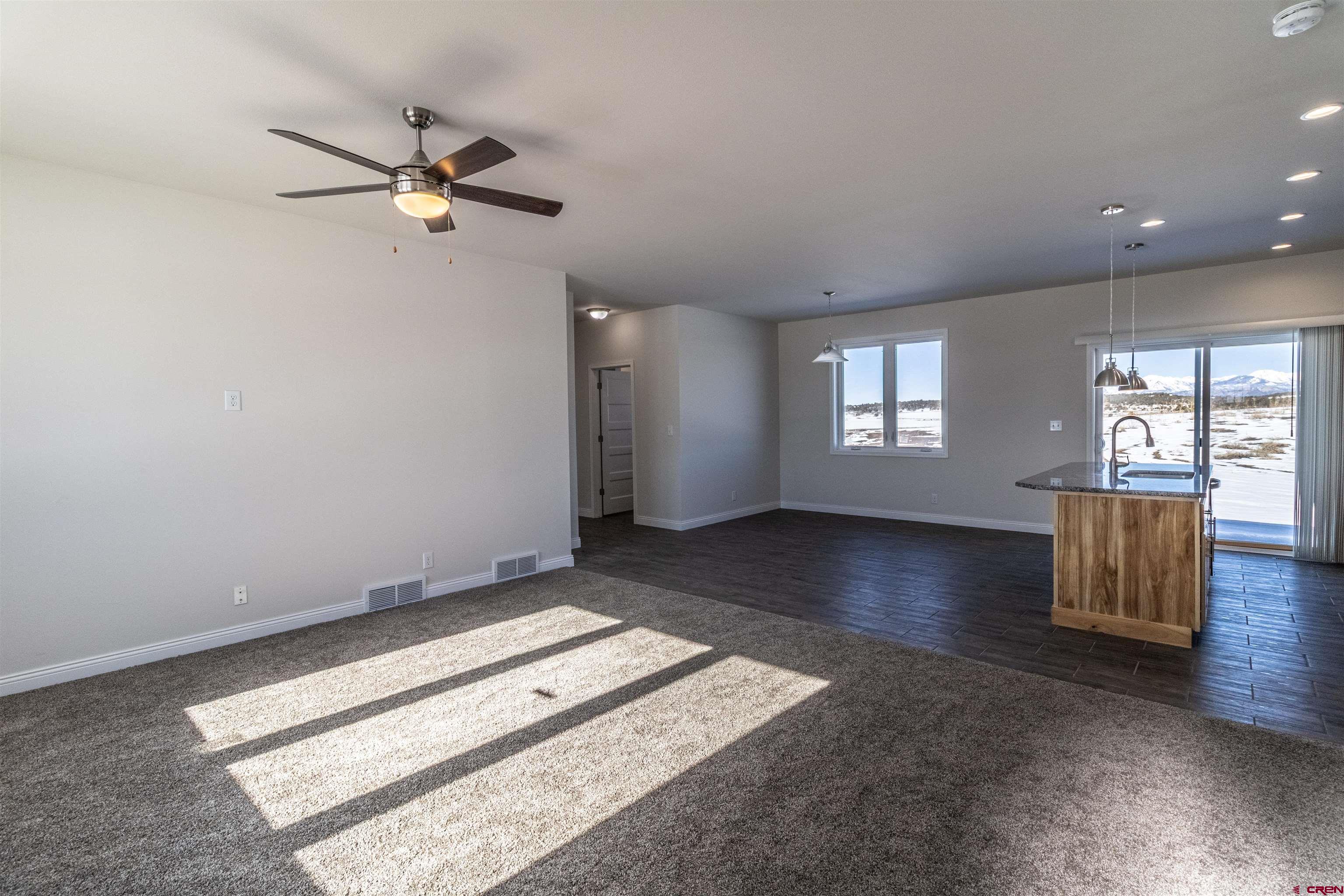 200 Chesterfield Place Ignacio, CO 81137 - Photo 5 of 35 a view of a room with window and wooden floor