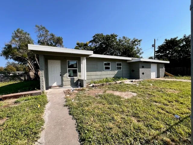 a front view of a house with a porch