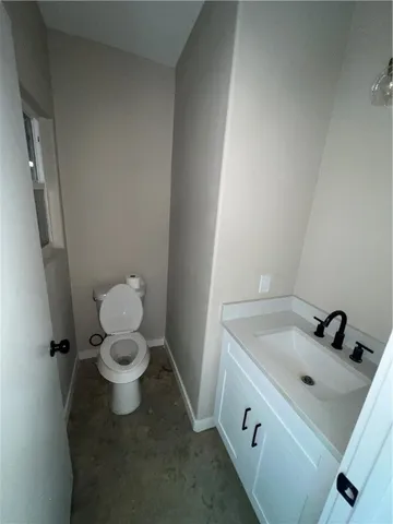 a bathroom with a sink and a toilet