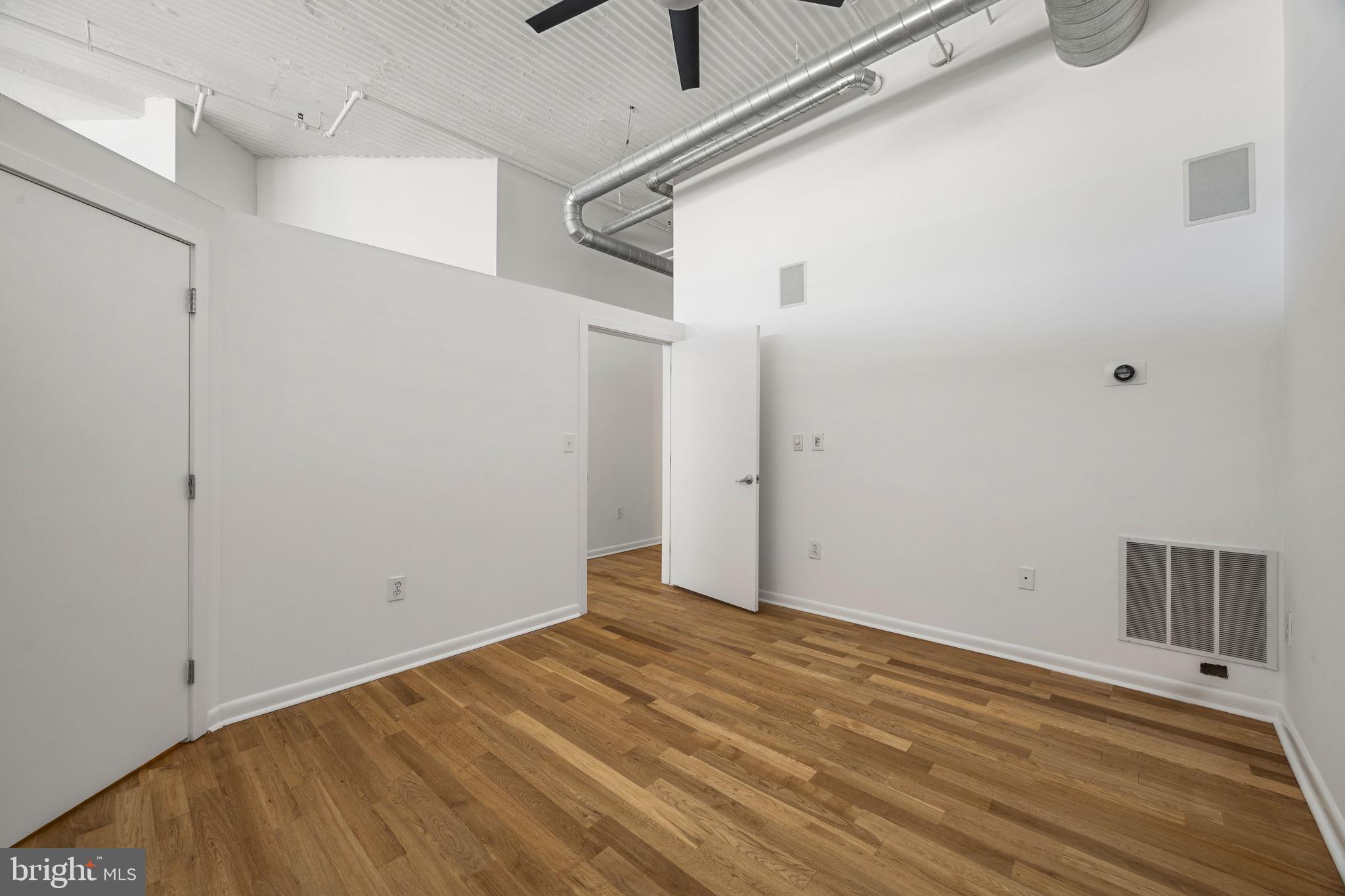 2200-28 Arch Street, Unit 716 Philadelphia, PA 19103 - Photo 12 of 35 a view of a room with wooden floor