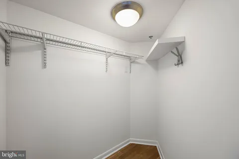 a view of a room with racks on the wall