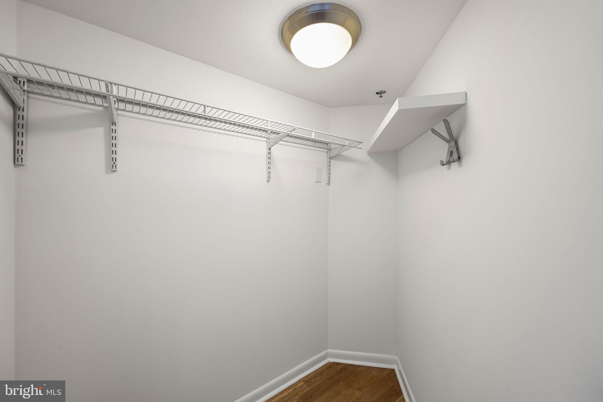 2200-28 Arch Street, Unit 716 Philadelphia, PA 19103 - Photo 18 of 35 a view of a room with racks on the wall