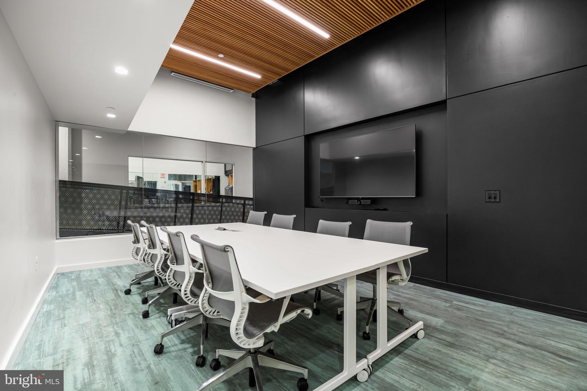 2200-28 Arch Street, Unit 716 Philadelphia, PA 19103 - Photo 29 of 35 a view of a dining room with furniture