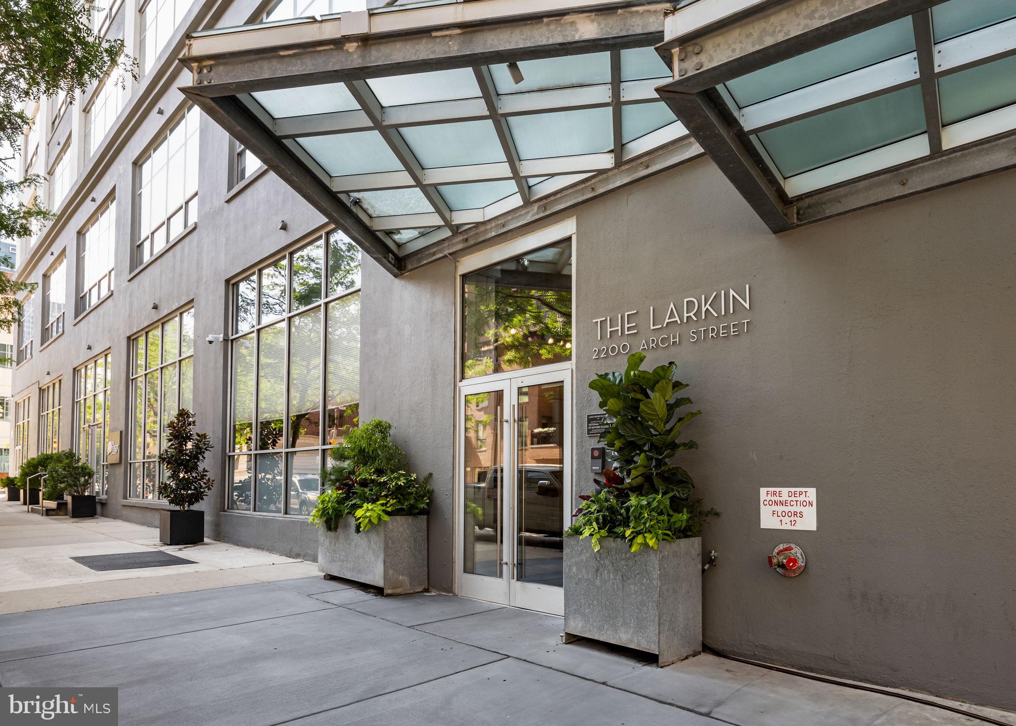 2200-28 Arch Street, Unit 716 Philadelphia, PA 19103 - Photo 4 of 35 a front view of a house with a potted plant