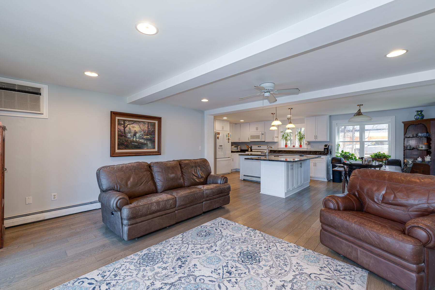 65 Santuit Lane Mashpee, MA 02649 - Photo 16 of 52 a living room with furniture and kitchen view
