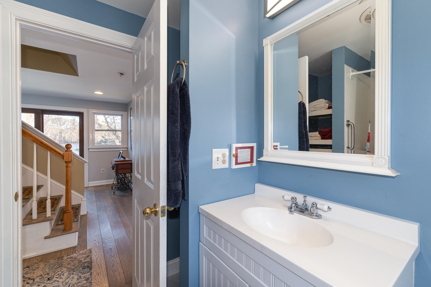65 Santuit Lane Mashpee, MA 02649 - Photo 21 of 52 a en suite bathroom with a sink double vanity and a mirror