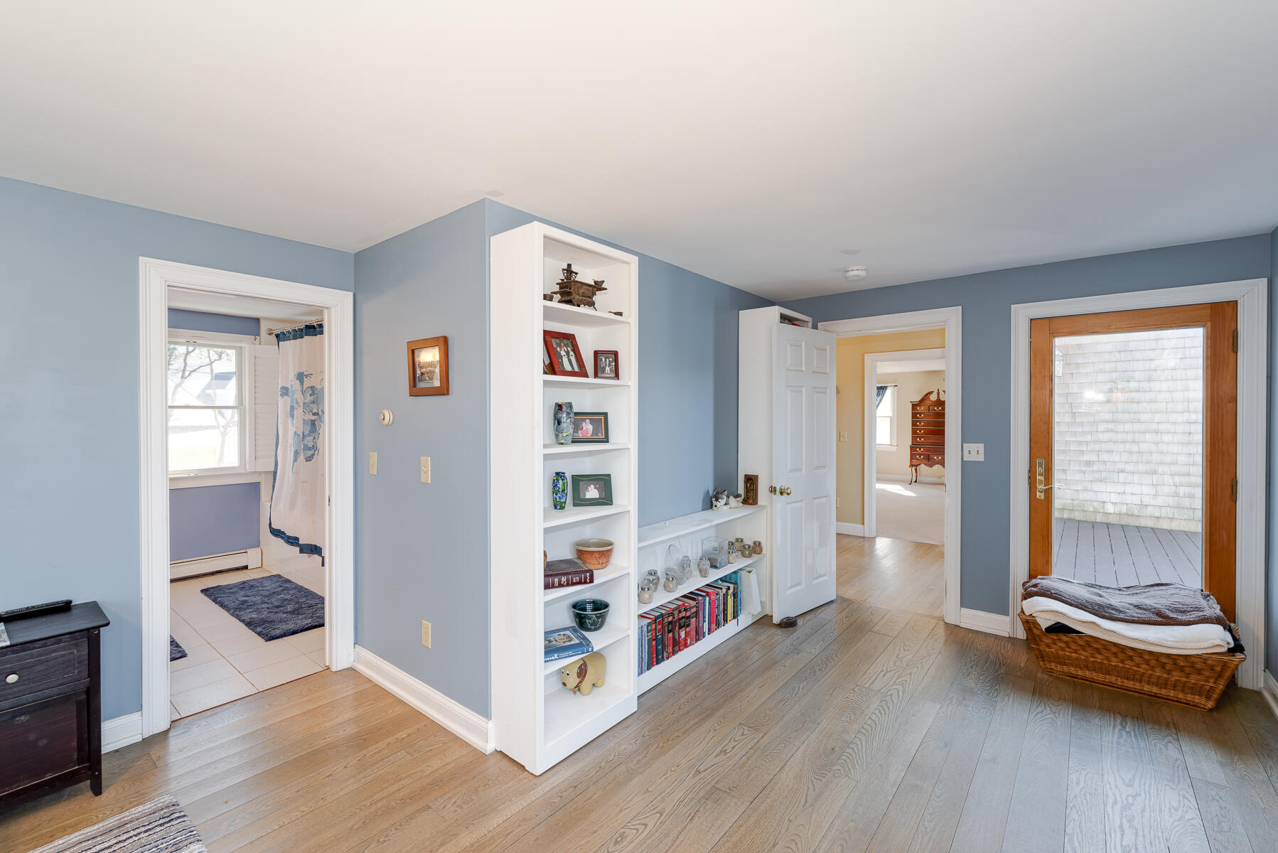 65 Santuit Lane Mashpee, MA 02649 - Photo 28 of 52 a room with furniture and a wooden floor