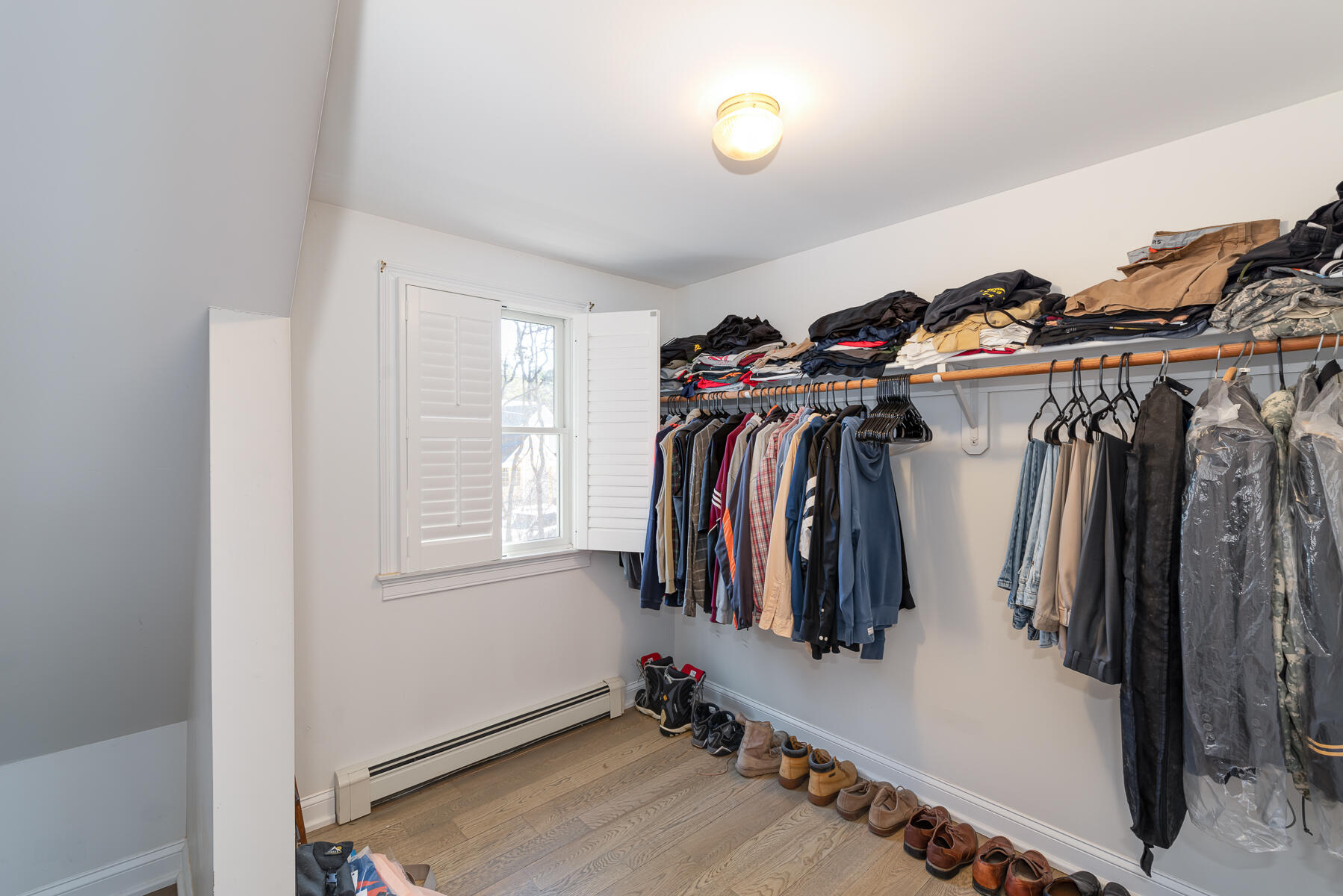 65 Santuit Lane Mashpee, MA 02649 - Photo 30 of 52 a view of walk in closet with clothes and shoes