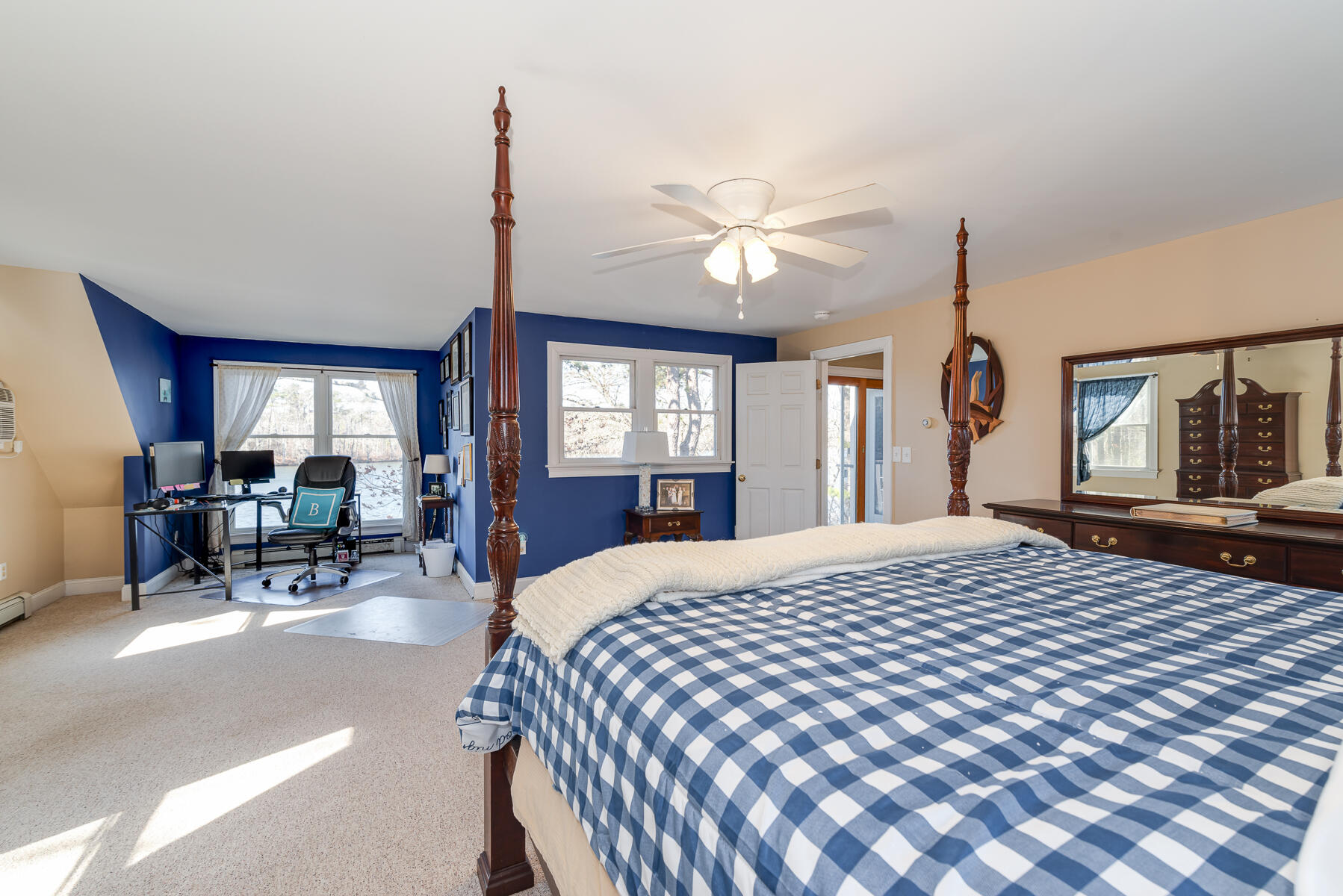 65 Santuit Lane Mashpee, MA 02649 - Photo 35 of 52 a living room with furniture a chandelier and a window