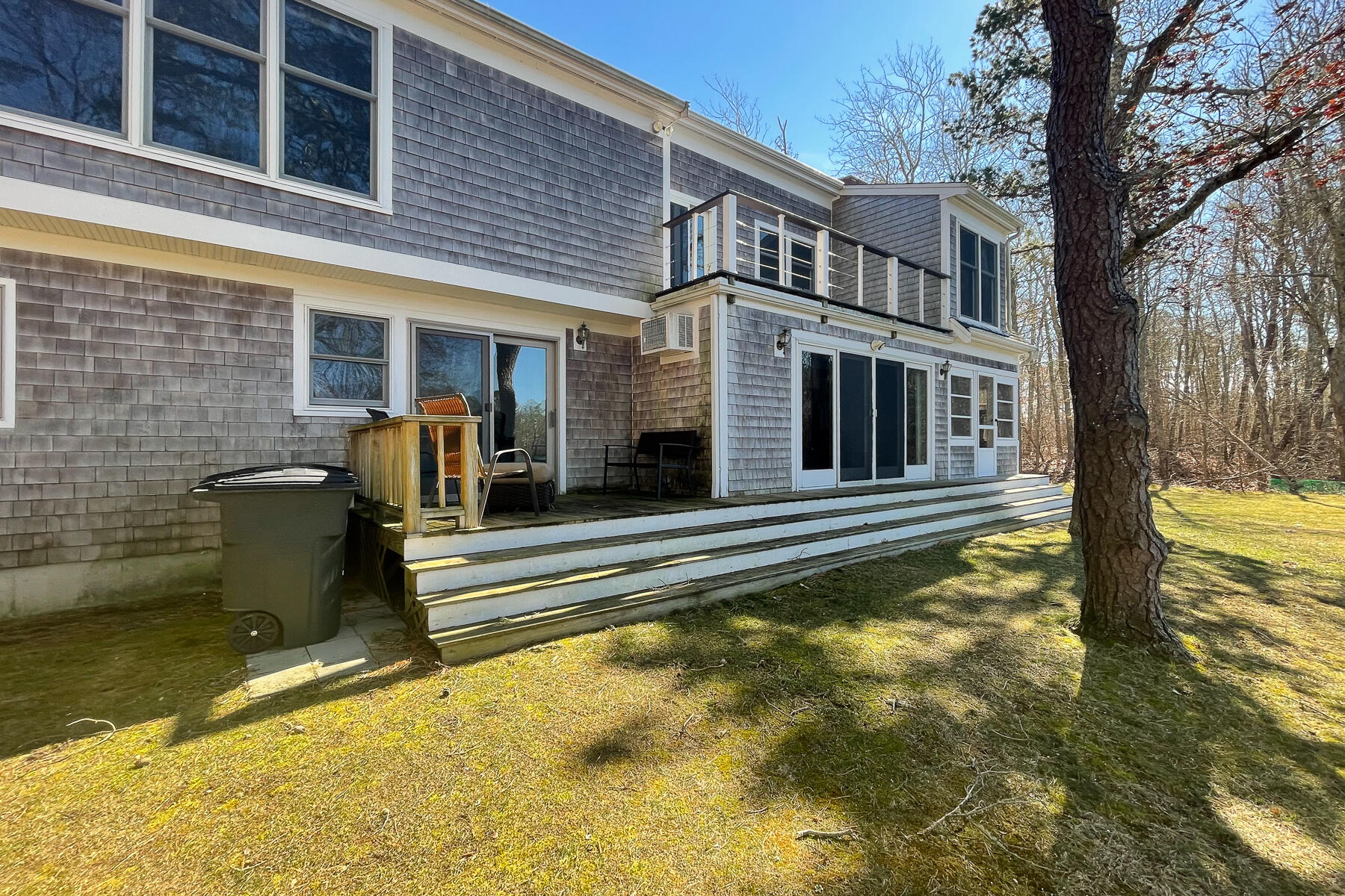 65 Santuit Lane Mashpee, MA 02649 - Photo 42 of 52 a view of a house with a swimming pool