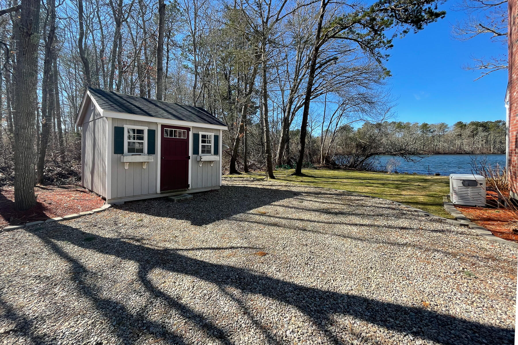 65 Santuit Lane Mashpee, MA 02649 - Photo 44 of 52 a view of a house with backyard and trees