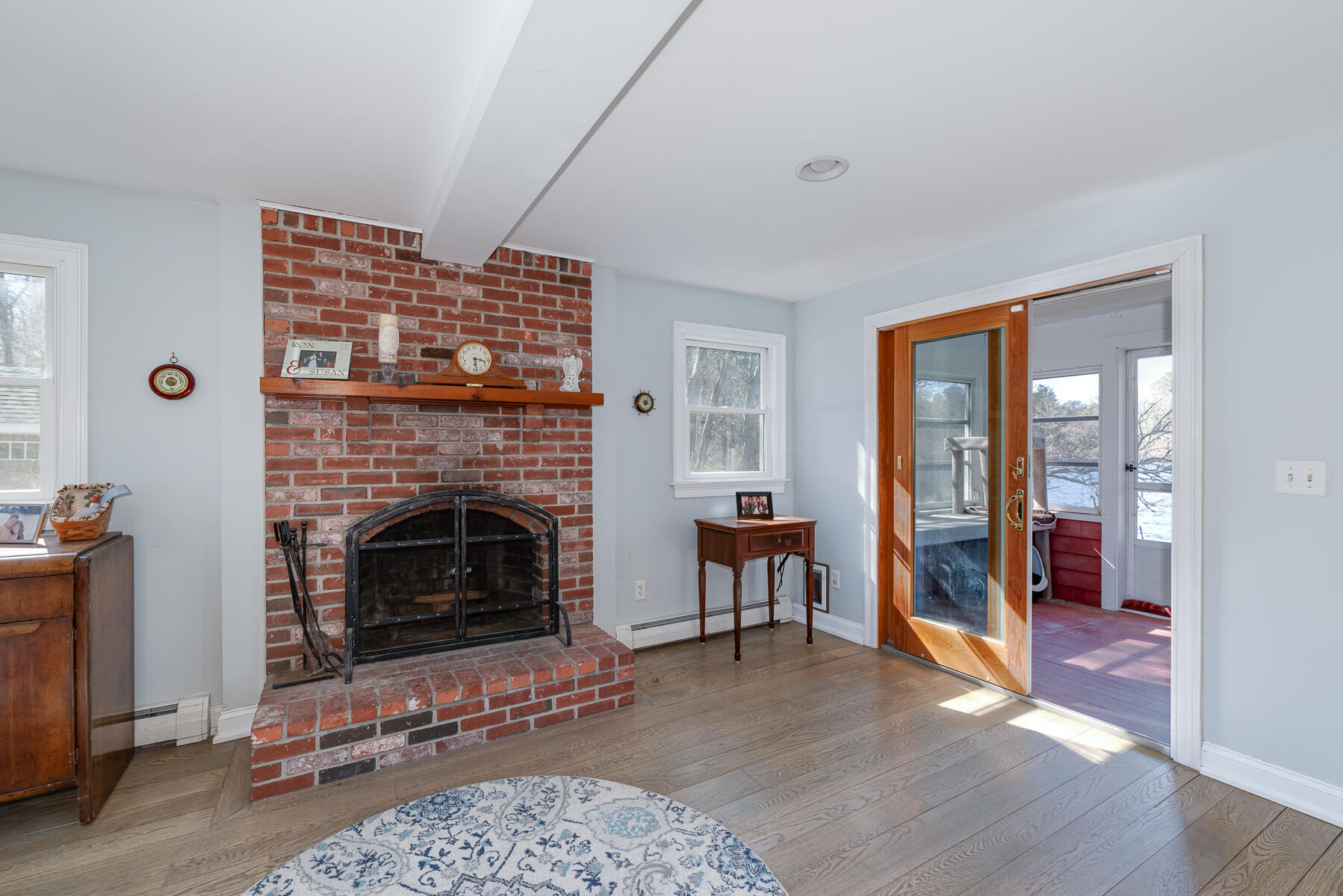65 Santuit Lane Mashpee, MA 02649 - Photo 5 of 52 a living room with furniture and a fireplace