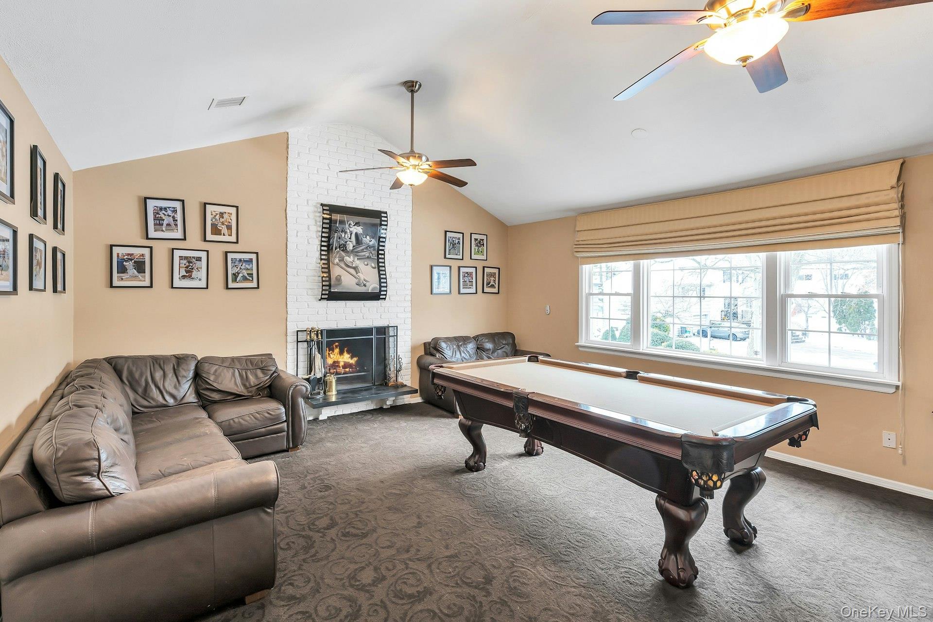 2043 Ripley Lane Merrick, NY 11566 - Photo 17 of 37 a living room with furniture and a window
